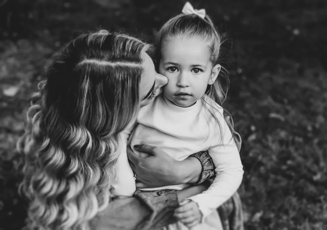 Two sisters together, black and white