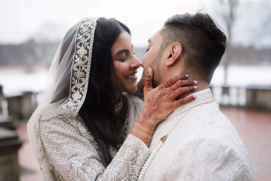 A bride and groom close together after the ceremony