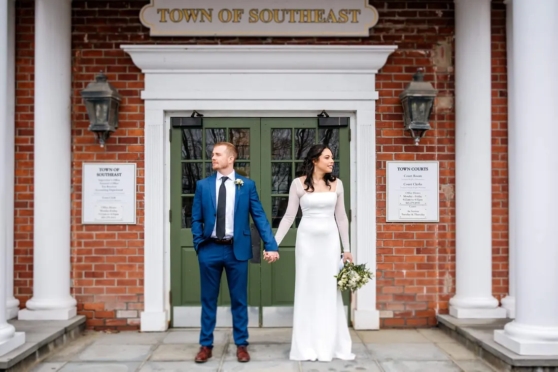 A couple outside the town courthouse after eloping